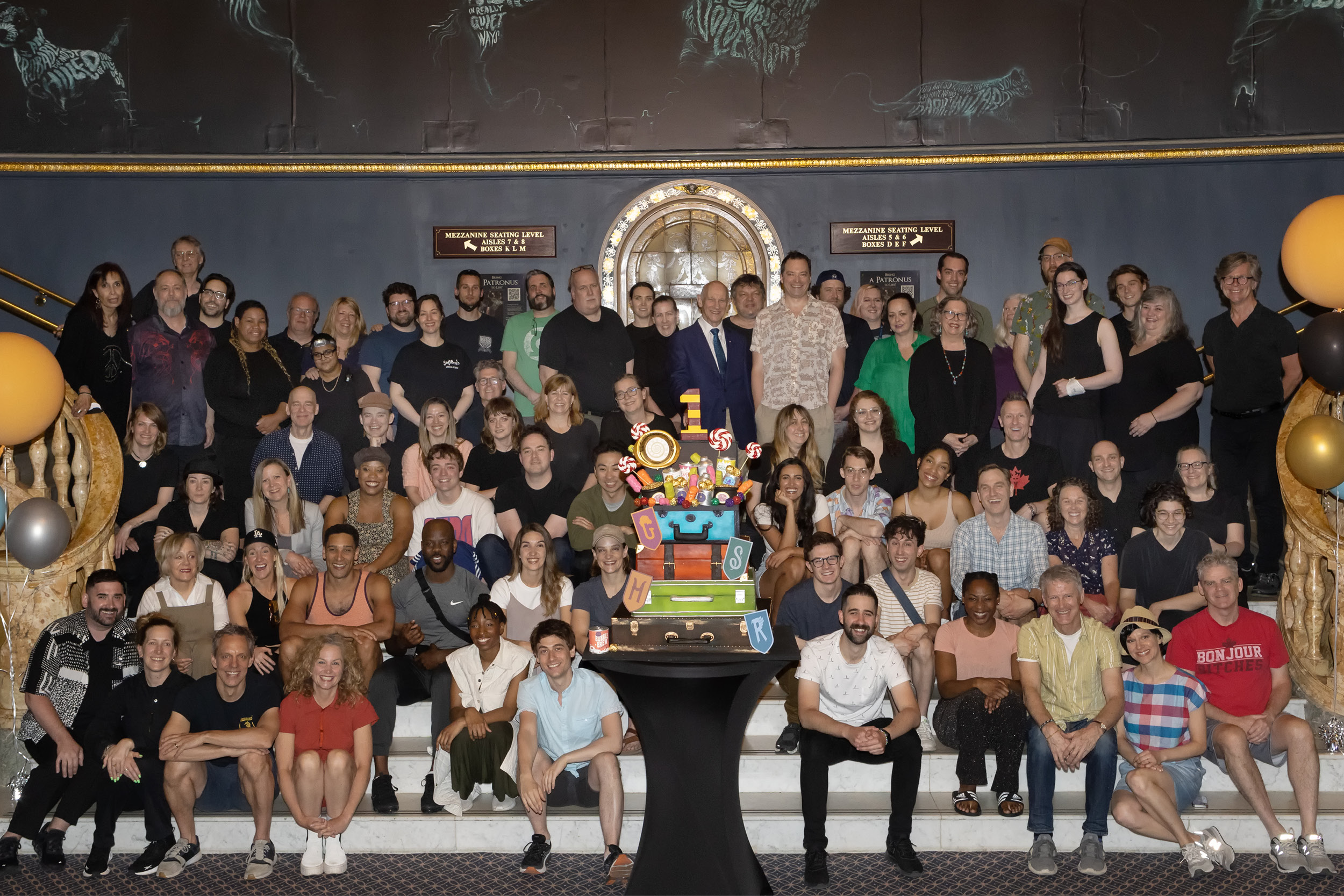 Harry Potter CAst with 1 year anniversary cake